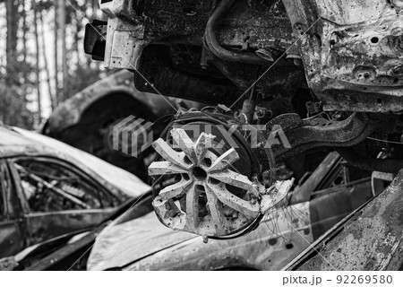 Black and white photo of the war in Ukraine - destroyed cars in Bucha district Black and white photo of the war in Ukraine - destroyed cars in Bucha district 92269580