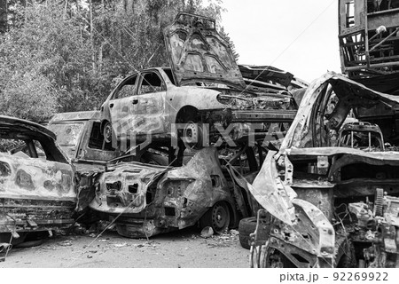 Dump of war-destroyed cars in Ukraine, black and white photo Dump of war-destroyed cars in Ukraine, black and white photo 92269922
