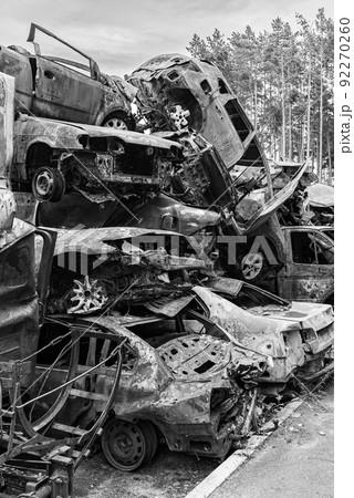 Dump of war-destroyed cars in Ukraine, black and white photo Dump of war-destroyed cars in Ukraine, black and white photo 92270260