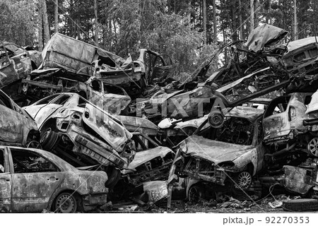 Black and white photo of the war in Ukraine - destroyed cars in Bucha district Black and white photo of the war in Ukraine - destroyed cars in Bucha district 92270353