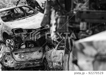Dump of war-destroyed cars in Ukraine, black and white photo Dump of war-destroyed cars in Ukraine, black and white photo 92270529