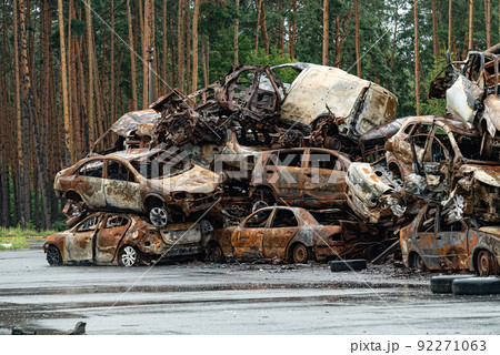 Consequences of the war in Ukraine - destroyed cars in Irpin, Bucha district. 92271063