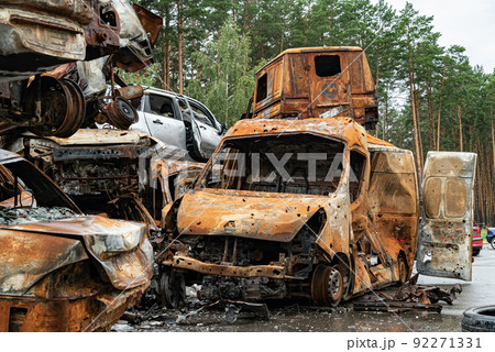 Consequences of the war in Ukraine - destroyed cars in Irpin, Bucha district. 92271331