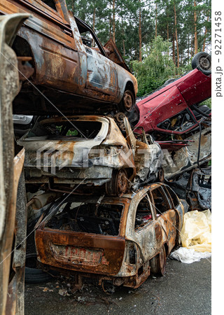 Dump of war-destroyed cars in Ukraine 92271458
