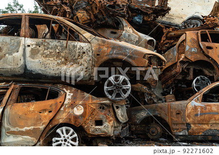 Shot and burned cars during the war in Ukraine Shot and burned cars during the war in Ukraine 92271602
