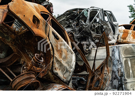 Consequences of the war in Ukraine - destroyed cars in Irpin, Bucha district. 92271904