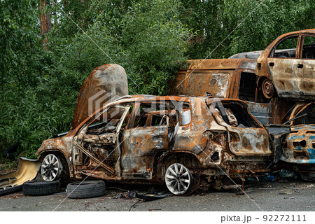 Dump of war-destroyed cars in Ukraine 92272111
