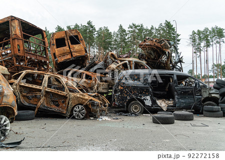 Shot and burned cars during the war in Ukraine Shot and burned cars during the war in Ukraine 92272158