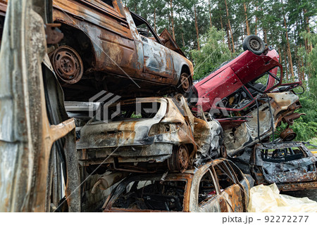Irpin, Bucha district, Ukraine - war-destroyed cars Irpin, Bucha district, Ukraine - war-destroyed cars 92272277
