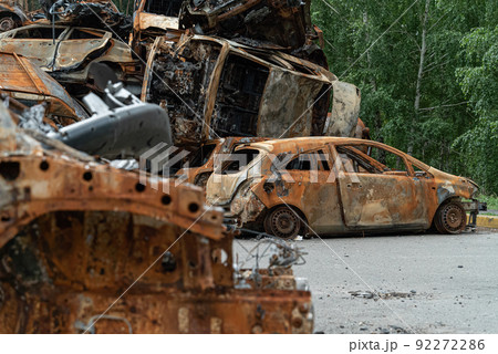 Shot and burned cars during the war in Ukraine Shot and burned cars during the war in Ukraine 92272286