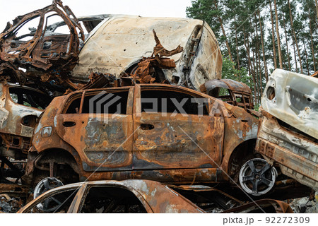 Consequences of the war in Ukraine - destroyed cars in Irpin, Bucha district. Consequences of the war in Ukraine - destroyed cars in Irpin, Bucha district. 92272309