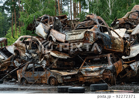 Shot and burned cars during the war in Ukraine Shot and burned cars during the war in Ukraine 92272371
