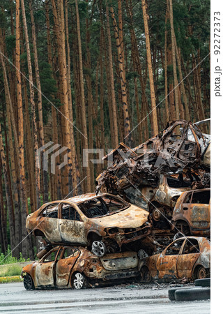 Consequences of the war in Ukraine - destroyed cars in Irpin, Bucha district. 92272373