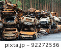 Dump of war-destroyed cars in Ukraine 92272536