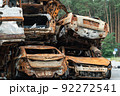 Dump of war-destroyed cars in Ukraine 92272541
