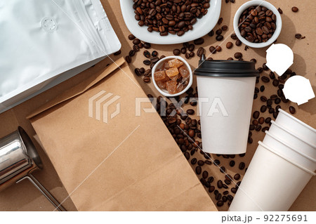 Blank brown kraft paper pouch bag with coffee beans and paper cup for your design Blank brown kraft paper pouch bag with coffee beans and paper cup for your design 92275691