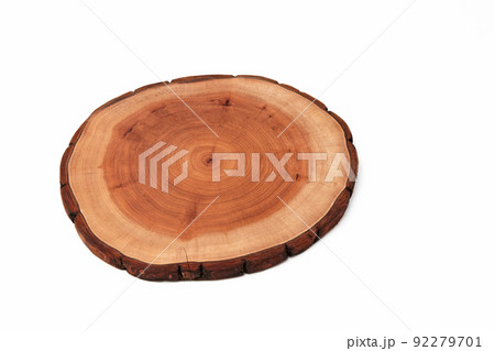 Wooden stand for a dish isolated on a white background. Tree trunk cut for product presentation demonstration Wooden stand for a dish isolated on a white background. Tree trunk cut for product presentation demonstration 92279701