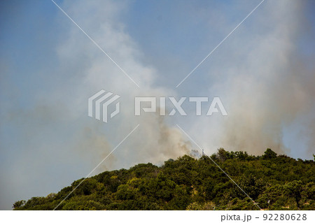 Forest Fire Smoke On The Slopes Hills. Fire In Mountain Forest. Wild Fire In Forests Forest Fire Smoke On The Slopes Hills. Fire In Mountain Forest. Wild Fire In Forests 92280628