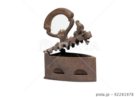 Antique iron on white background Antique iron on white background 92281978