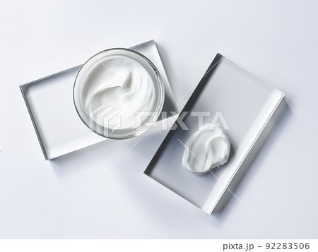 Face cream moisturiser jar and product sample on glass, beauty and skincare, cosmetic science concept 92283506