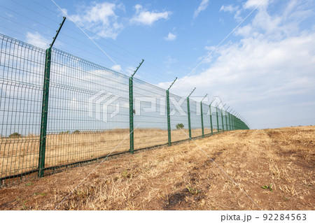New Security Fencing Boundary Outdoors. 92284563