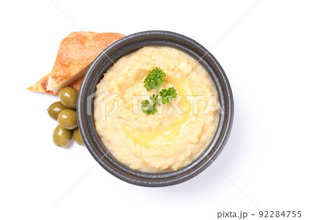 Bowl of hummus isolated on white background Bowl of hummus isolated on white background 92284755