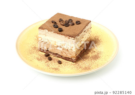 Plate with Tiramisu cake isolated on white background 92285140