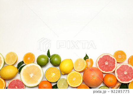 Different citrus fruits on white background, space for text 92285775
