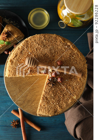 Concept of tasty dessert with honey cake, top view 92286228