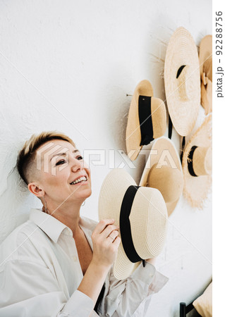 Home decor and interior design. Straw hats like interior decorate the walls in apartment Home decor and interior design. Straw hats like interior decorate the walls in apartment 92288756