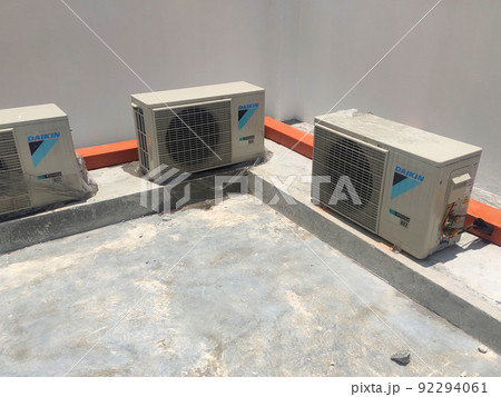 SELANGOR, MALAYSIA -MARCH 5, 2022: Outdoor unit for air conditioning system. This unit is placed on the outside of the building to help release heat from the indoor air conditioning unit. 92294061