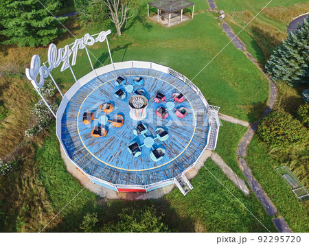 Aerial shot of the bumper car complex with the green lawns surrounding the platform 92295720