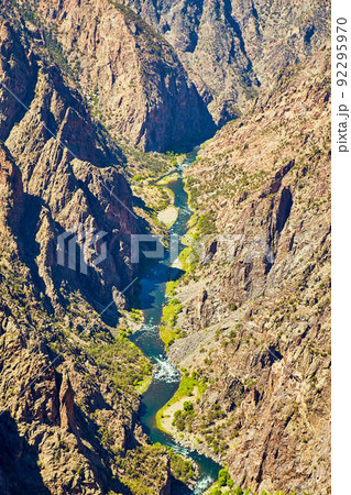 Vast canyon gorge with blue river 92295970