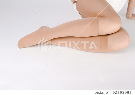 Medical Compression Stockings for varicose veins and venouse therapy. Compression Hosiery. Sock for sports isolated on white background. Black color socks mock up for advertising, branding, design. Medical Compression Stockings for varicose veins and venouse therapy. Compression Hosiery. Sock for sports isolated on white background. Black color socks mock up for advertising, branding, design. 92295992