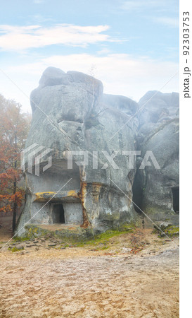 Forest and ancient rocks of Dovbush in Bubnishche in the Carpathian mountains. Foggy wheather. Forest and ancient rocks of Dovbush in Bubnishche in the Carpathian mountains. Foggy wheather. 92303753