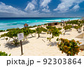 Sandy beach with azure water on a sunny day near Cancun, Mexico 92303864