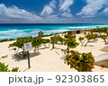 Sandy beach with azure water on a sunny day near Cancun, Mexico 92303865