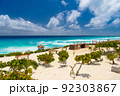Sandy beach with azure water on a sunny day near Cancun, Mexico 92303867
