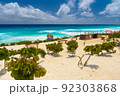 Sandy beach with azure water on a sunny day near Cancun, Mexico 92303868