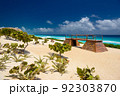 Sandy beach with azure water on a sunny day near Cancun, Mexico 92303870
