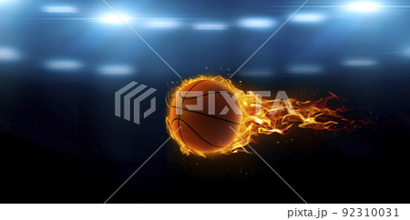 asketball on fire in basketball court stadium with lights in the field shining asketball on fire in basketball court stadium with lights in the field shining 92310031