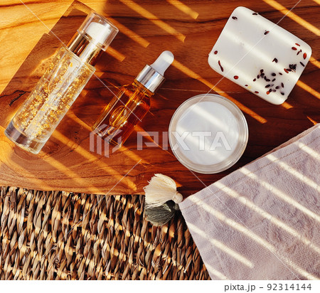 Skincare, spa and body care cosmetic products on wooden background, flatlay design, organic beauty routine and natural cosmetics concept Skincare, spa and body care cosmetic products on wooden background, flatlay design, organic beauty routine and natural cosmetics concept 92314144