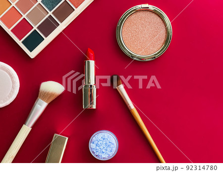 Beauty, make-up and cosmetics flatlay design with copyspace, cosmetic products and makeup tools on red background, girly and feminine style concept Beauty, make-up and cosmetics flatlay design with copyspace, cosmetic products and makeup tools on red background, girly and feminine style concept 92314780