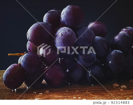 Ripe juicy dark grapes on wooden desk, food and wine, organic fruits concept 92314883
