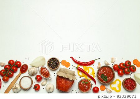Concept of spicy sauce with Adjika, space for text Concept of spicy sauce with Adjika, space for text 92329073