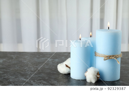 Concept of relaxation with aroma candles, space for text Concept of relaxation with aroma candles, space for text 92329387