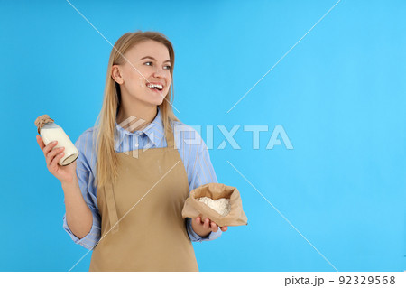 Concept of cooking with young woman, space for text Concept of cooking with young woman, space for text 92329568