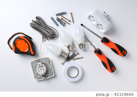 Concept of electrician or electrical tools on white background 92329600