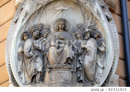 Descent of the Holy Spirit, facade of a palace in Rome, Italy 92331915