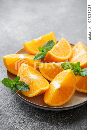 Fresh ripe oranges on concrete background 92333288